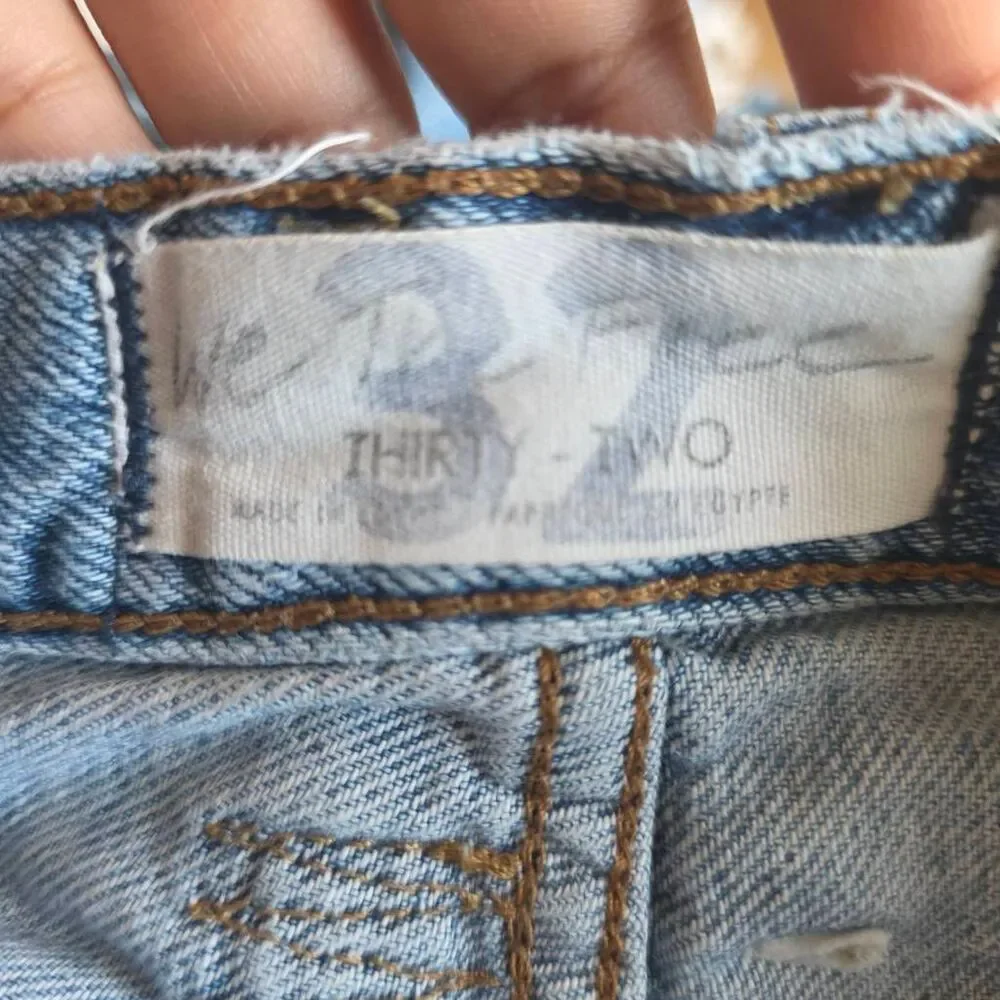 Free people we the free Sz 32 wash blue  distressed jean shorts
